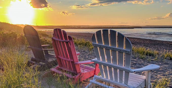 Chairs facing Cape Cod shoreline
