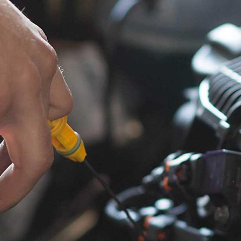 CAA Mechanic working on car